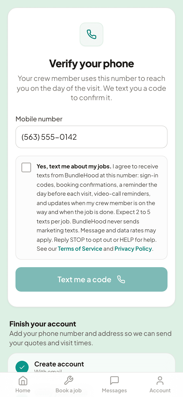 The sign-up phone step: a mobile number field, the unticked consent checkbox with its full text, and the disabled 'Yes, text me a code' button